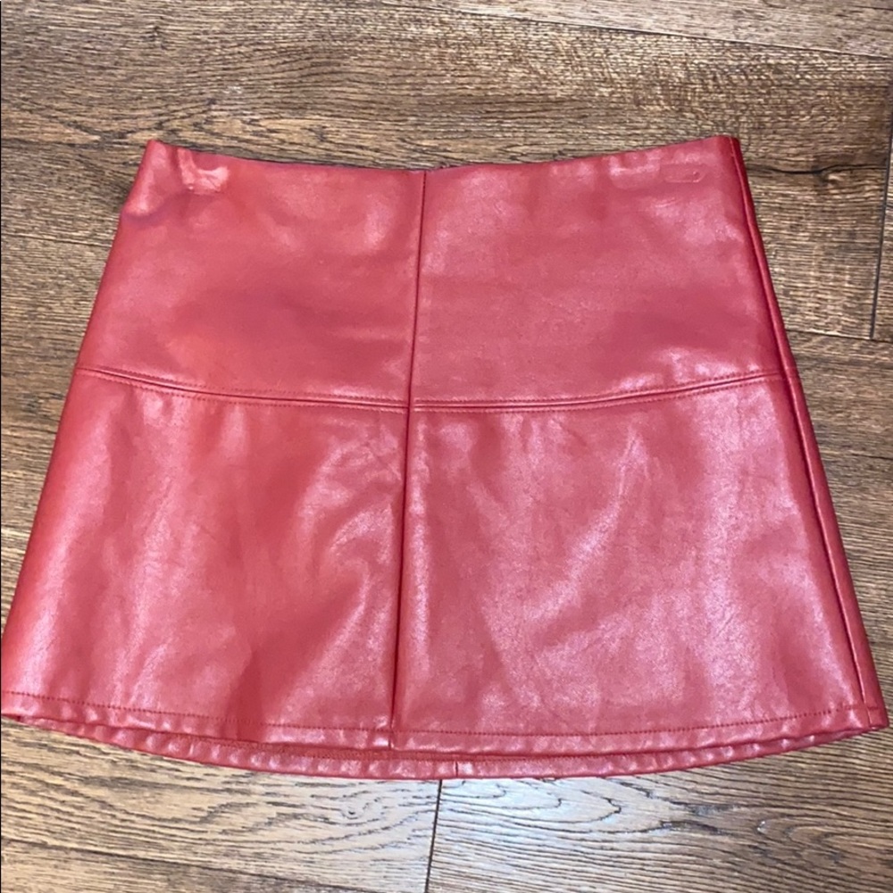 Red vinyl mini skirt!